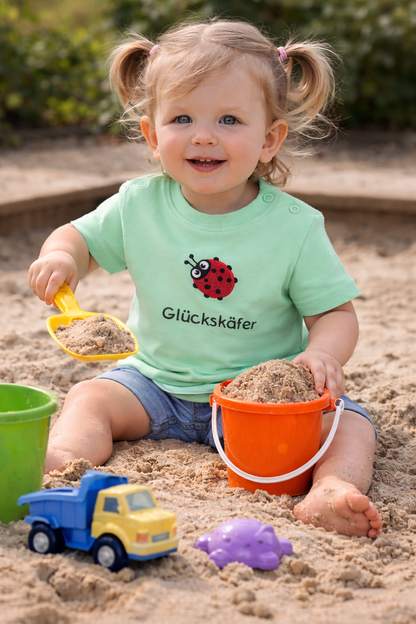Baby und Kleinkind T-Shirt „Glückskäfer“